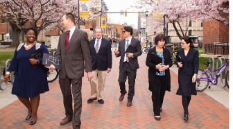 A group walks toward the camera