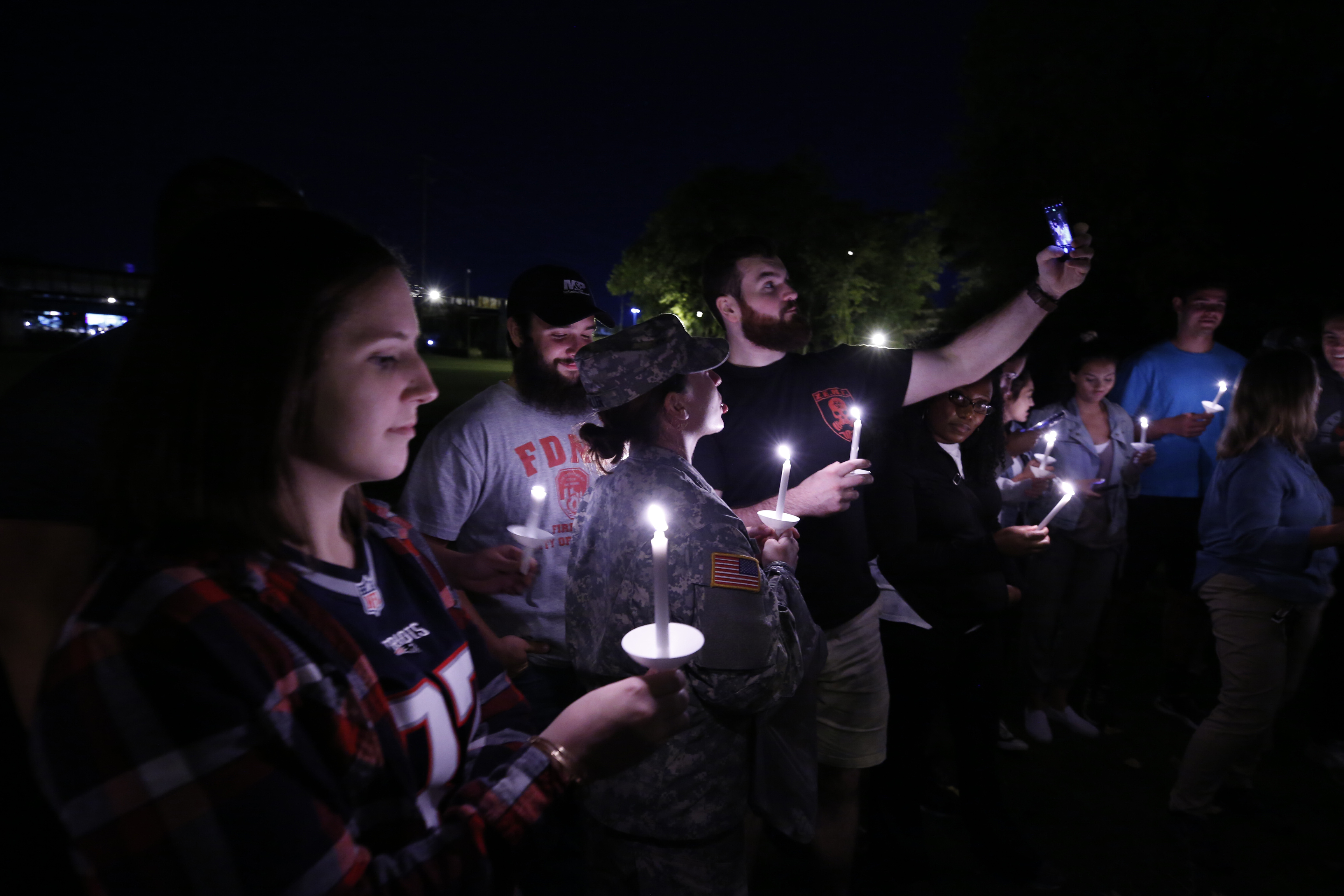 VCU Wilder School students participate in a candle lighting ceremony to honor the lives of the enslaved at Richmond's African Ancestral Burial Grounds on Sept. 7.