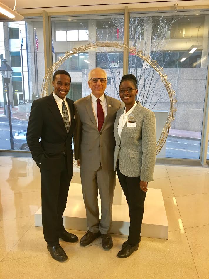 Wilder School Dean John Accordino with Stephen Guyton Jr. (left) and Sombo Chunda.