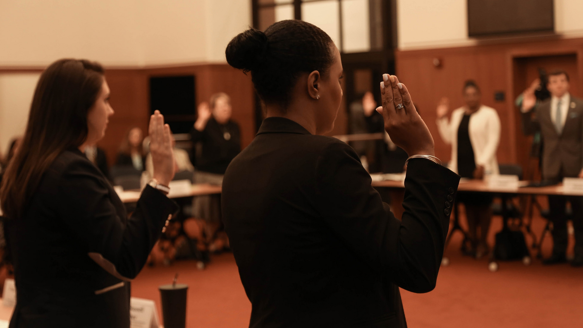 Nakeina Douglas-Glenn,Ph.D., is sworn in by Gov. Terry McAuliffe during the inaugural meeting of the Task Force on Millennial Civic Engagement at the Patrick Henry Building on July 28. 