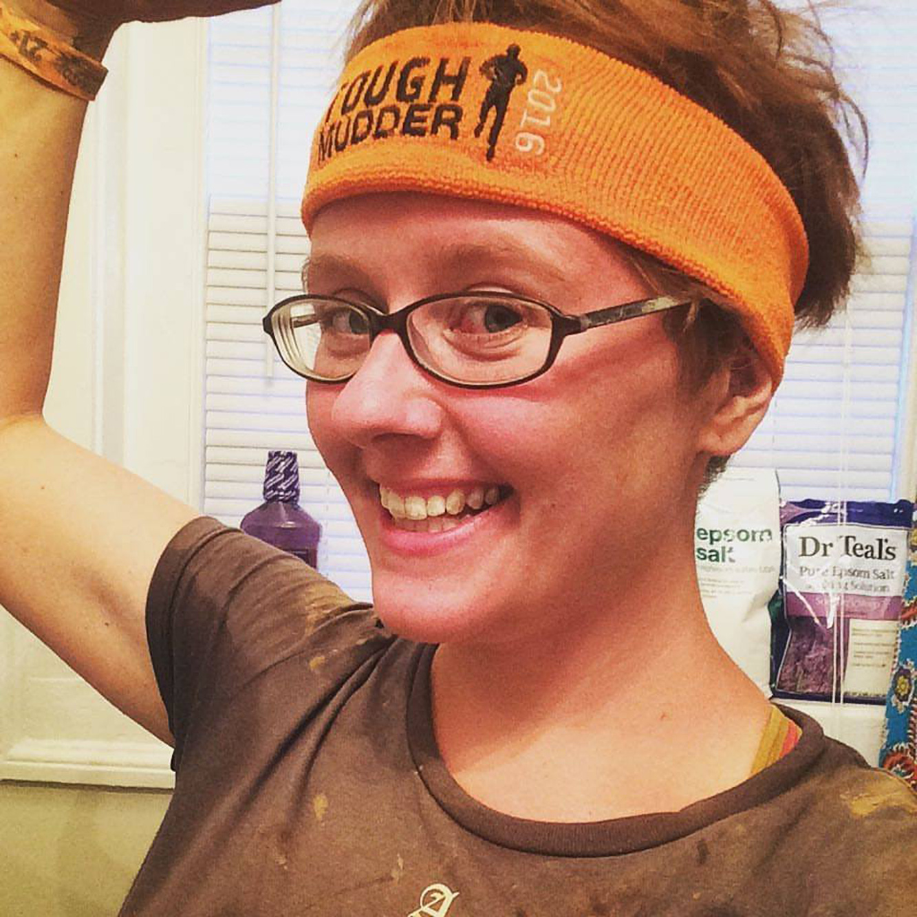 Danielle Shutt celebrates with a smile following the completion of the Tough Mudder Obstacle Course on June 11. 