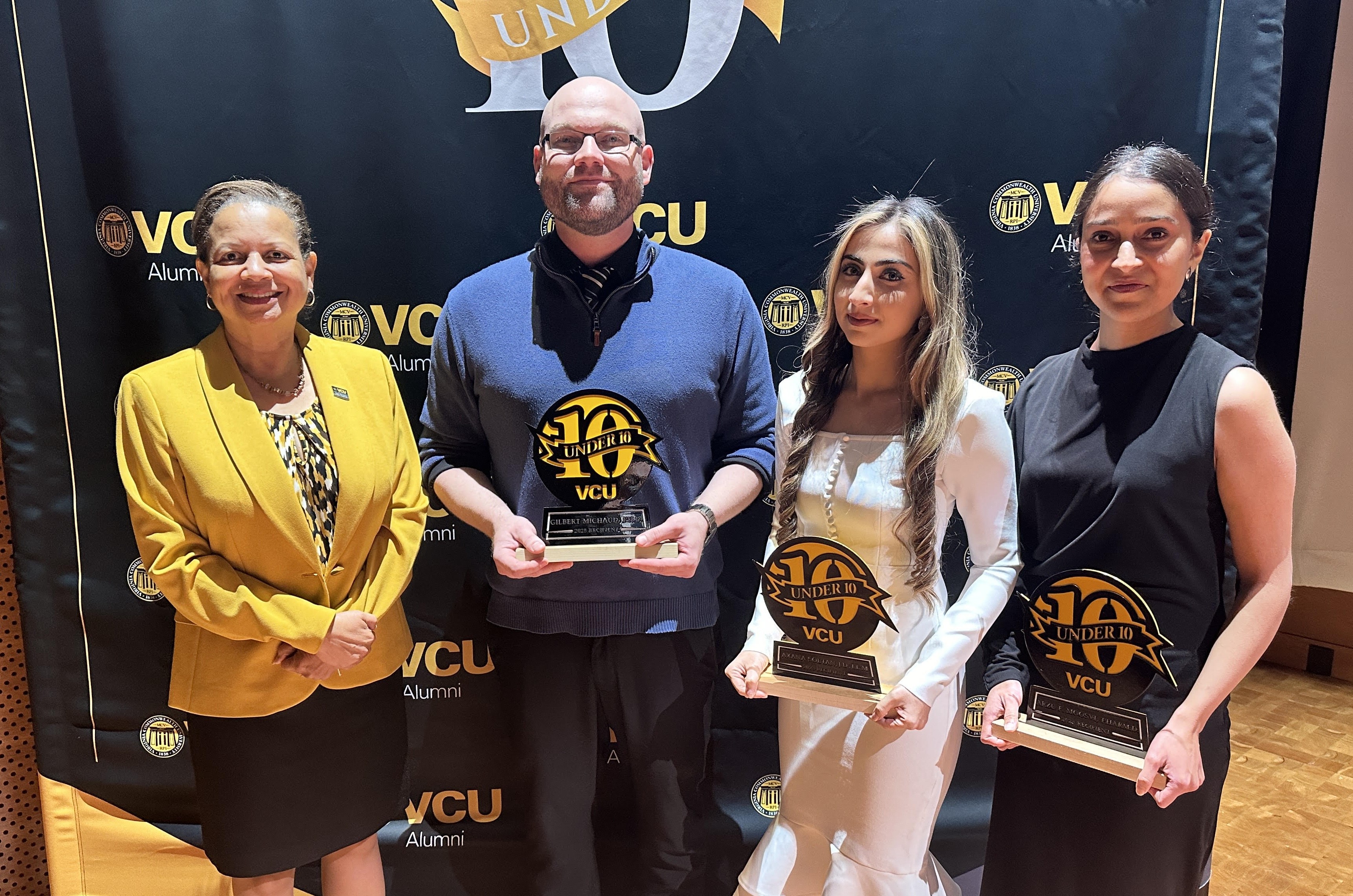 From left: Wilder School Dean Susan Gooden with 10 Under 10 recipients Gilbert Michaud, Axana Soltan and Arzu Moosvi. Photo: Stevan Dozier