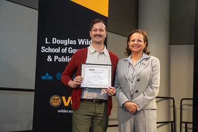 Sean Sukol and Wilder School Dean Susan T. Gooden at the Wilder School Student Awards Ceremony, April 18, 2024. Sukol proudly received his Master's Degree in Public Administration this spring.