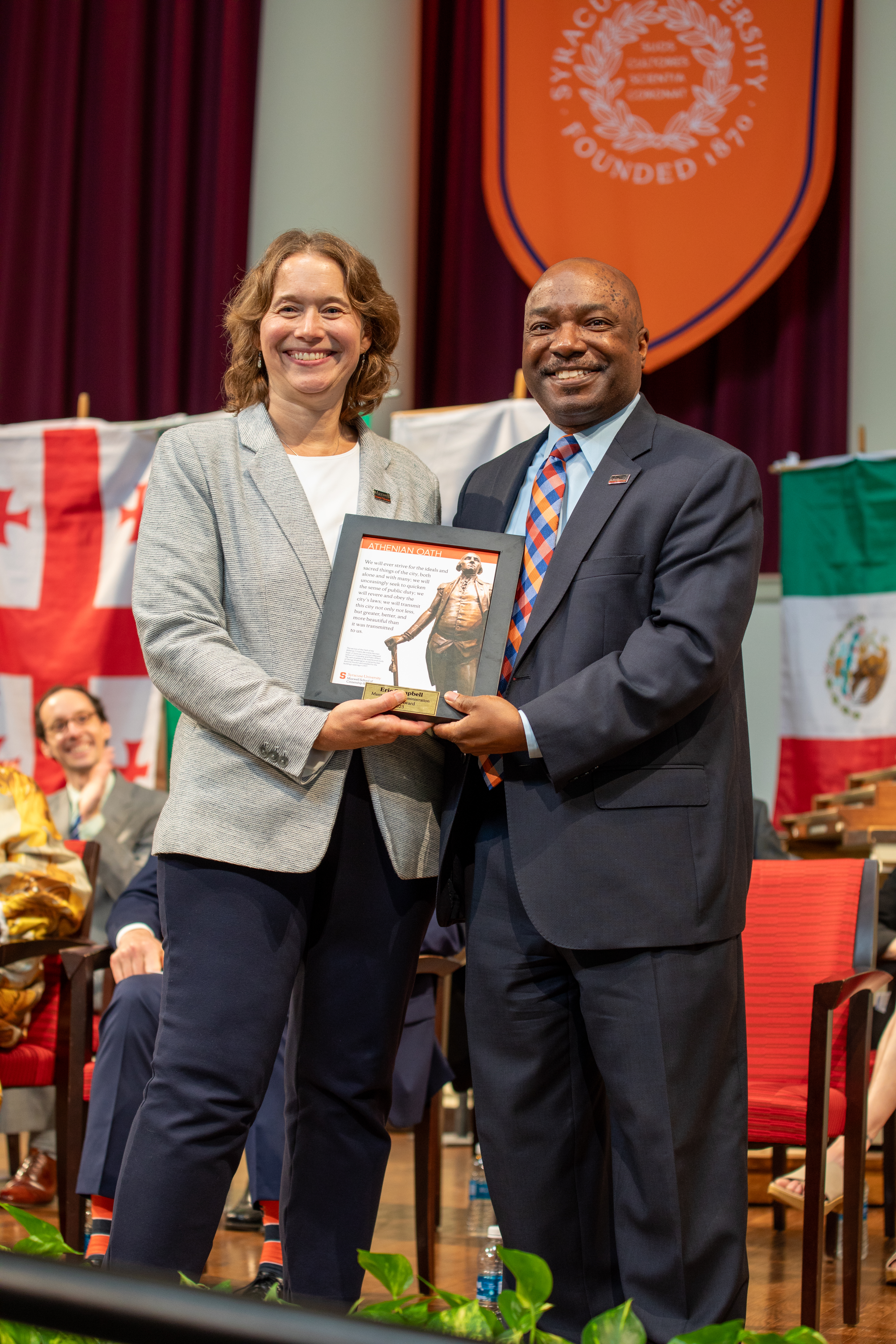 Eric Campbell receiving the Public Administration Alumni Award from the Maxwell School.