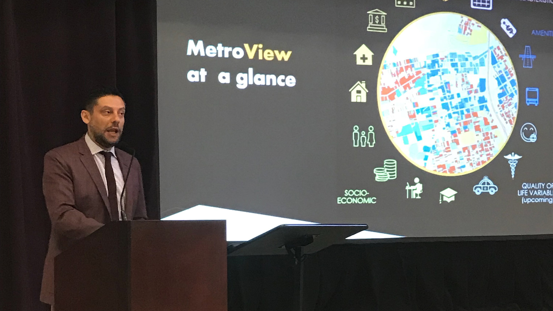 (Top) Fabrizio Fasulo, Ph.D., director of the Wilder School's Center for Urban and Regional Analysis, shared information at  the Communities and Public Safety Stakeholders’ Roundtable: An Analysis of Root Causes of Crime in the City of Richmond. (Below) Sarin Adhikari, Ph.D., research economist at CURA, makes a presentation.