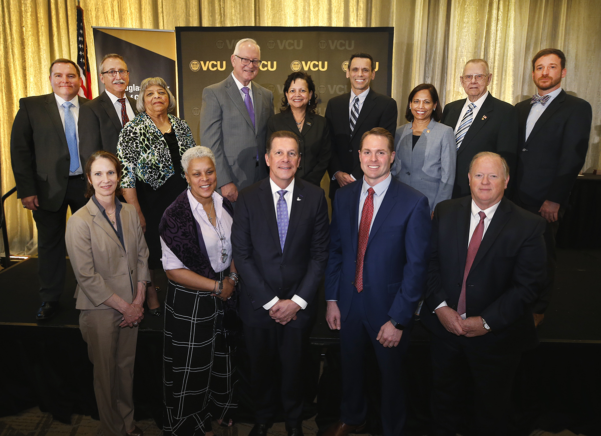 Wilder School Interim Dean Susan Gooden, Ph.D. (center). VCU President Michael Rao, Ph.D. and EVGA Committee Chair and VCU Board of Visitors member Robert Holsworth, Ph.D., with 2019 EVGA honorees. Back row, left to right: Joseph Walters; Deputy Director of Administration, VA Department of Corrections, Manuel Alvarez; Chairman, Goochland County Board of Supervisors, Gloria Turner; Chairman, Goochl