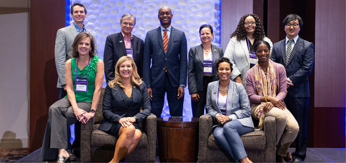 Wilder School 2018 NASPAA Faculty Delegation with Federal Reserve Bank of Atlanta President, Raphael Bostic. Back row, left to right: William Pelfrey, Blue Wooldridge, Raphael Bostic, Susan Gooden, Elsie Harper-Anderson, Myung Jin. Front row, left to right: Sarah Jane-Brubaker, Robyn McDougle, Shajuana Isom-Payne and Wilder alumna Najmah Thomas.