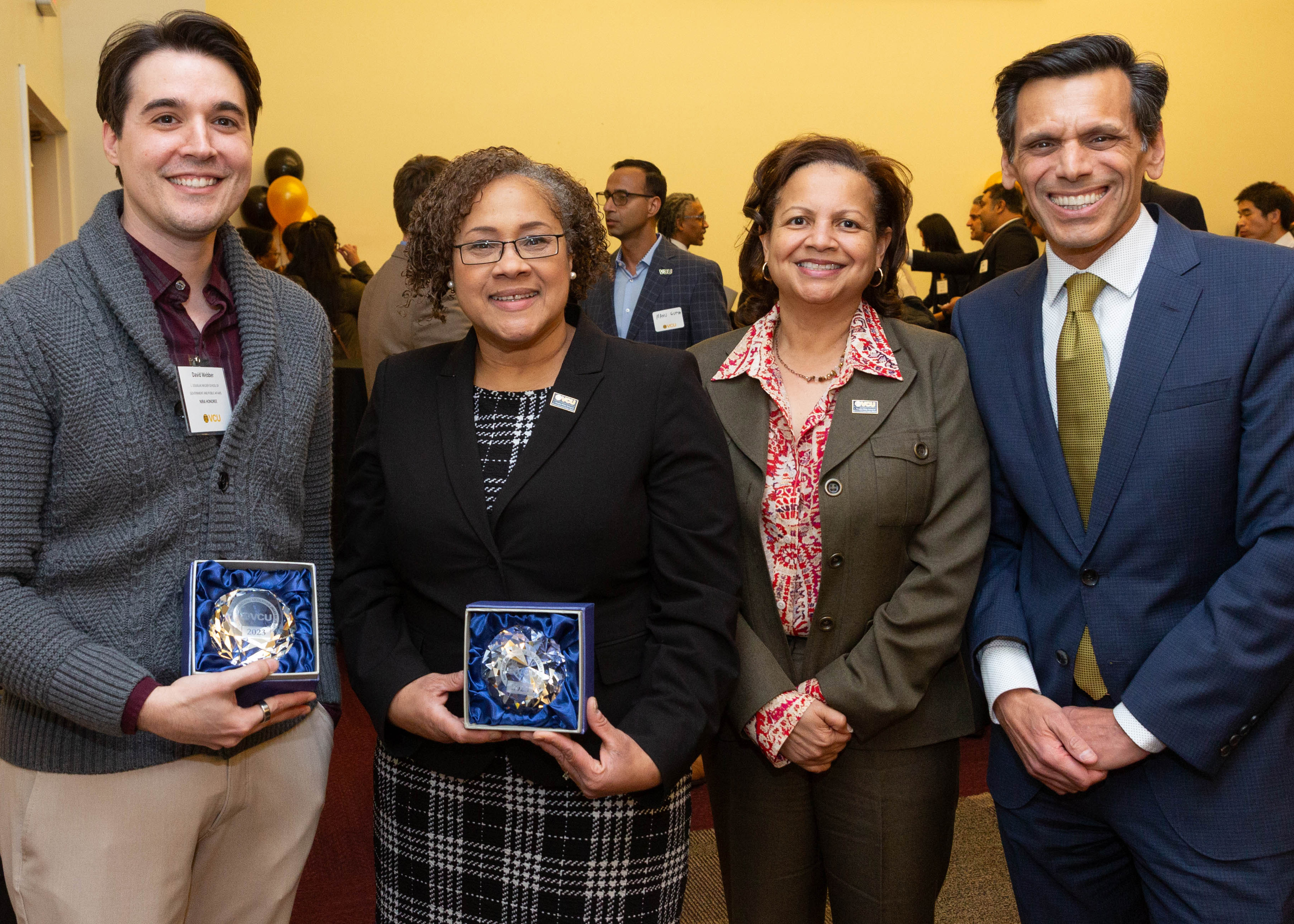 From left to right: David Webber, Ph.D., Associate Professor of Homeland Security and Emergency Preparedness; RaJade Berry-James, Ph.D., Senior Associate Dean of Faculty and Academic Affairs; Susan Gooden, Ph.D., Dean of the Wilder School; and Michael Rao, Ph.D., President of Virginia Commonwealth University, gather to celebrate the inaugural National/International Recognition Awards (NIRA).