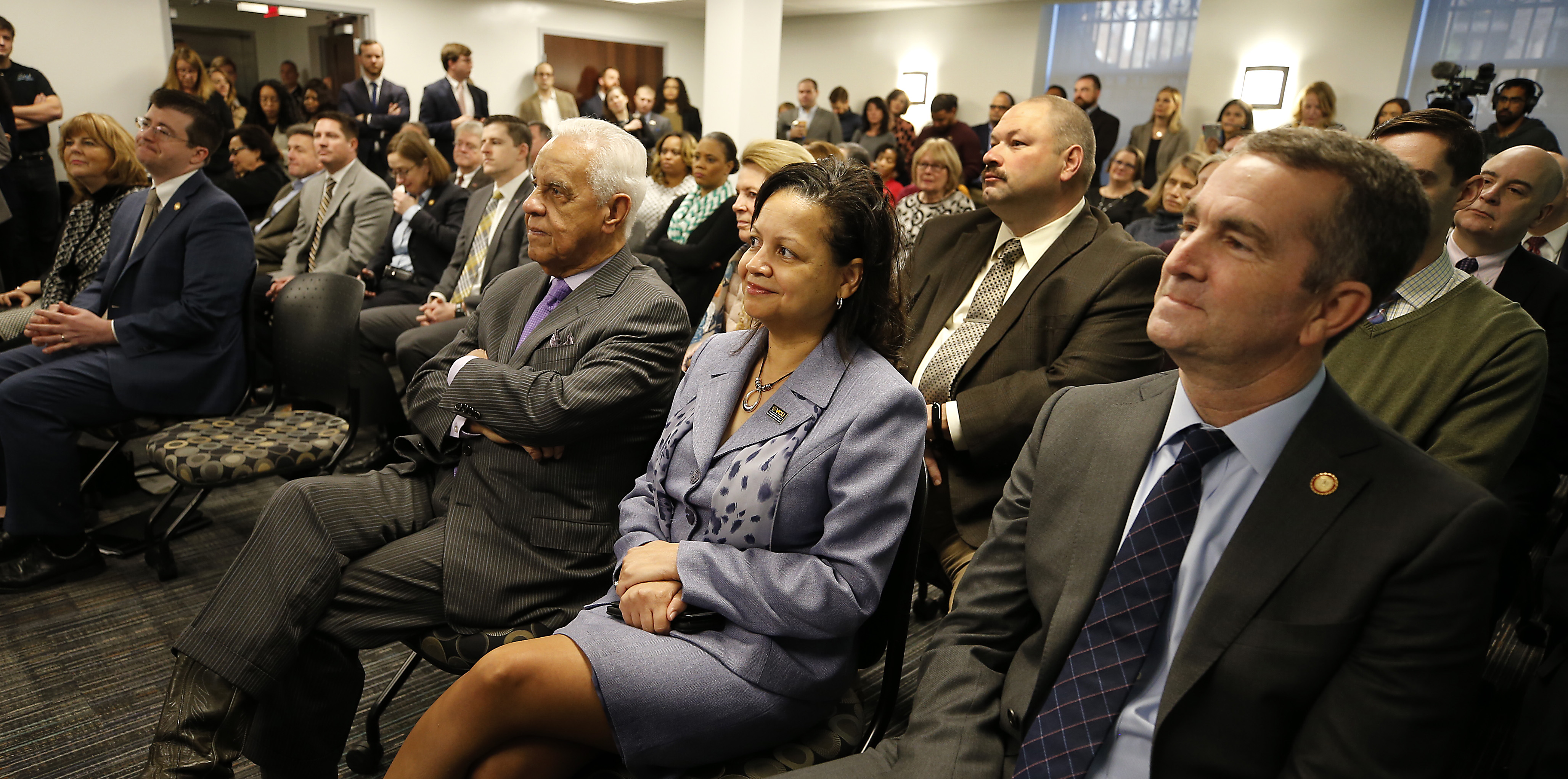 Top: L. Douglas Wilder, Virginia's 66th governor; Interim Dean Susan Gooden, Ph.D.; Governor Ralph Northam; and Lt. Gov. Justin Fairfax. Second: Secretary of Commerce and Trade Brian Ball; Gov.  Northam; Lt. Gov. Fairfax; and Secretary of Education Atif Qarni. Below: Gov. Wilder, Dr. Gooden and Gov. Northam listen to VCU Provost Gail Hackett's welcoming remarks.