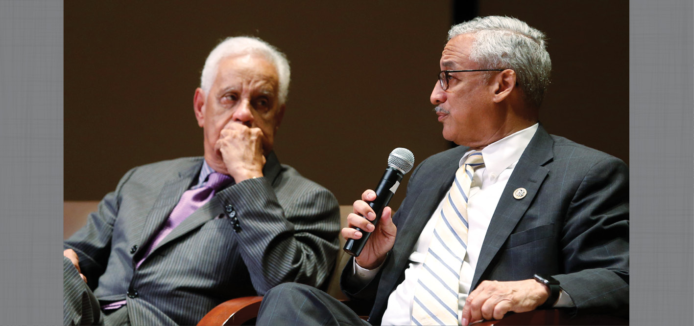 Governor L. Douglas Wilder listens to U.S. Rep. Robert 