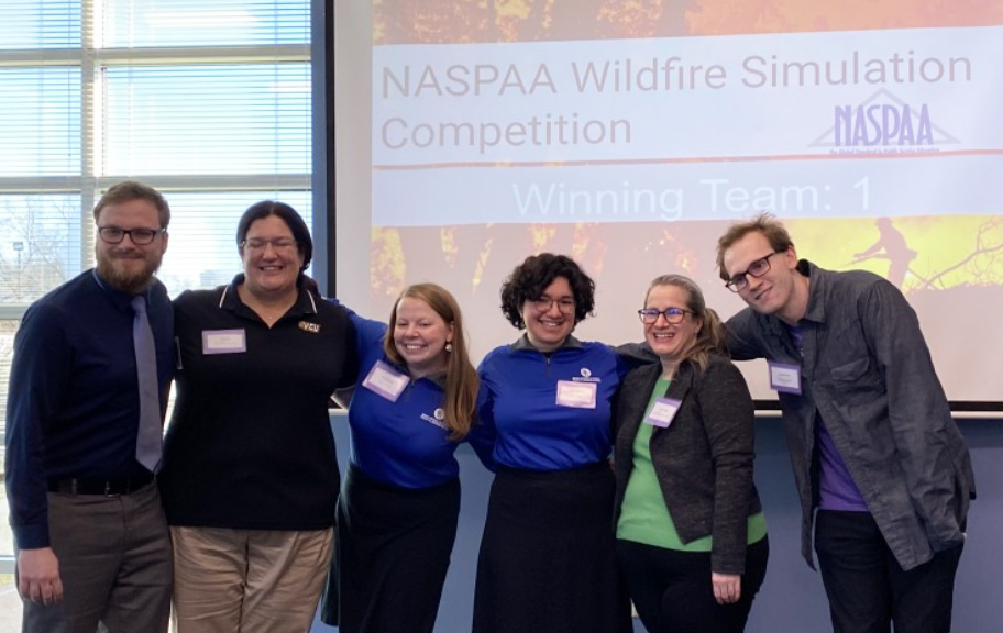 Amie Fuller (second from left), poses with fellow graduate student team members from other universities.